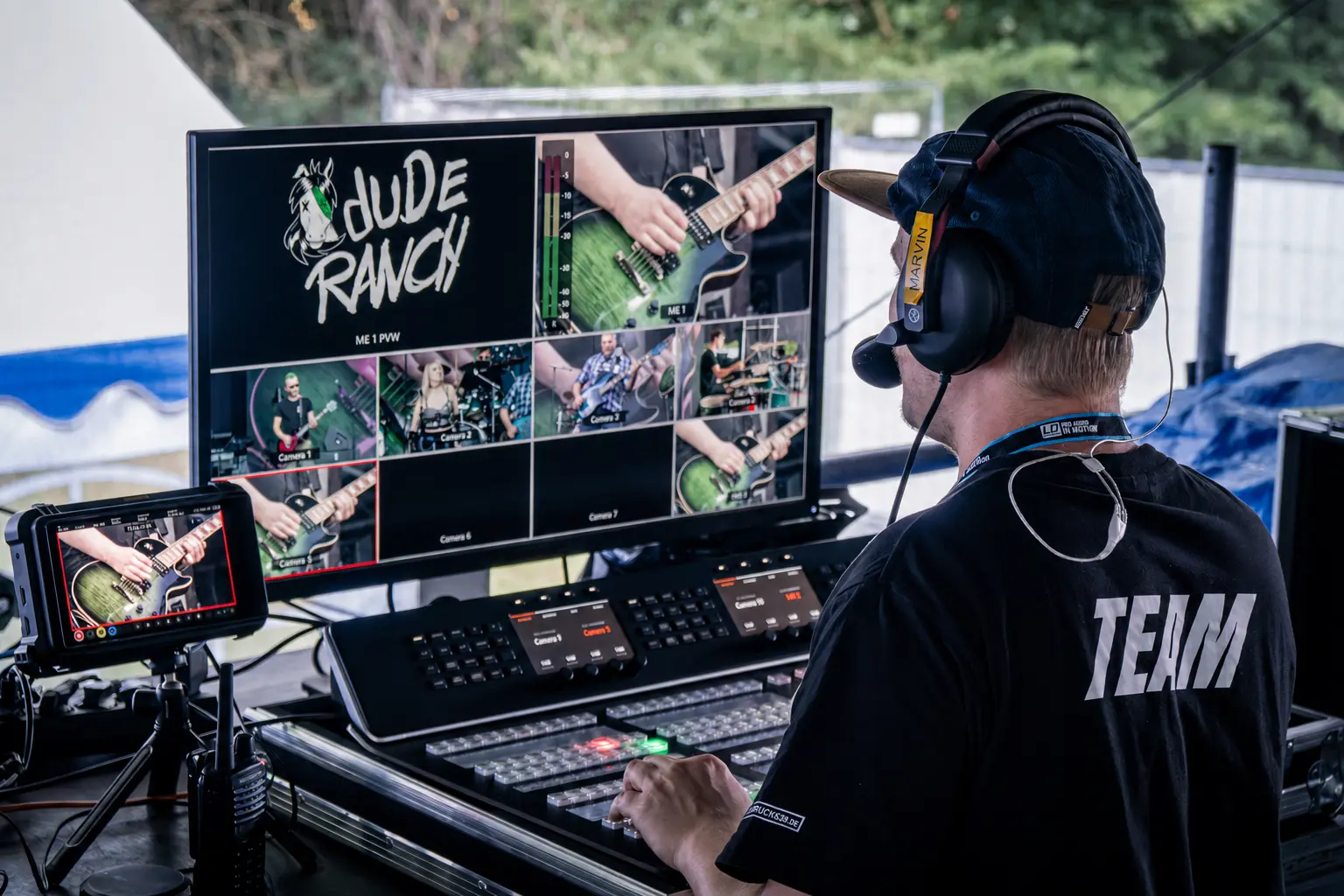Studio4x vision director at a mobile multi-camera control desk during a concert production, with multiview and a monitor